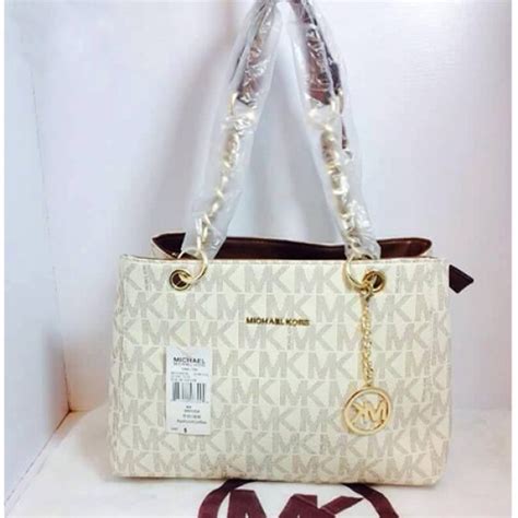 mk bags replica online|michael kors purse logo.